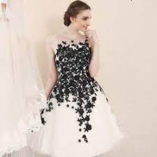 Black wedding dresses are often considered to be rebellious or rocked only by goth queens. Black White Wedding Reception Dresses From Darius Couture