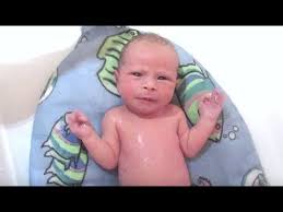 After bathing him it's pajama time! Baby Boy S First Bath Dyches Fam Youtube