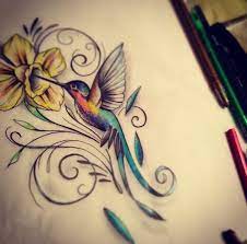 Humming Bird And Flower Tattoo Bird And Flower Tattoo Tattoos Hummingbird Tattoo