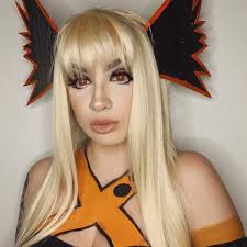 Swipe to see the first attempt years ago ! I was also wearing the head  piece in the first look upside down so that's progress in its self! 😂  #bakugou #katsukibakugou #bakugoucosplay #