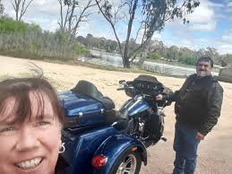 Riding along the Murray River with a small group