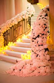 Consider purchasing table arrangements and other decorations from budget stores. 12 Fabulous Wedding Staircase Decoration Ideas Wedding Stair Decor