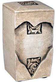 Raku heart cremation urns for pets with paw print accents. Heart Keepsake Pet Cremation Urn Extra Small Size
