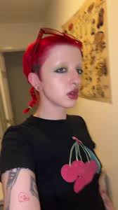 Girl with Red Hair Stops and Looks at Camera