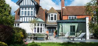 Rear extensions are popular to make transitions between indoor and outdoor spaces and often lead off from kitchens at the rear of the house. The Anatomy Of A Glass Box Extension Iq Glass News