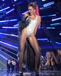 MTV VMAs hostess Miley Cyrus causes a stir with 11 eyebrow-raising outfits  | Daily Mail Online