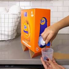 Useful travel accessories to take in your hand luggage: C Mon Tide S New Detergent Looks Like A Box Of Wine Nerdist