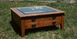 Gold medium round metal coffee table with lift top. Coffee Tables Sun Valley Wood Works