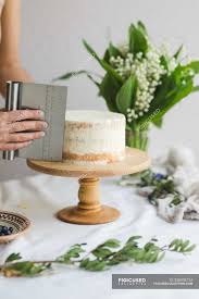 Now that my kids are getting older, i want to continue the birthday tradition of making them a special birthday cake, but my decorating expertise is definitely a beginner level. Pastry Chef Preparing Naked Wedding Birthday Cake Candy Maker Decorating Rustic Layer Homemade Cake With Cream Selective Focus Piece Of Cake Vegan Raw Cake Sweets Yummy Stock Photo 338936734