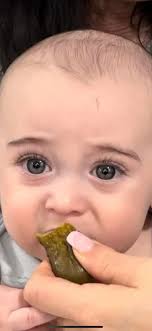 My little grand nephew has eyes as green as his pickle 😂 ( his first taste  of one. He liked it)