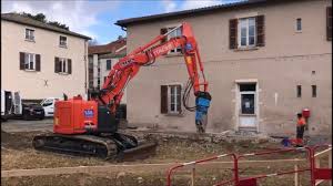 Presentation Pelle A Chenilles Hitachi Zx225 Us Et Cisaille Arden Cu 130