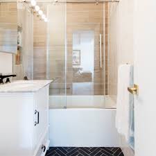 Simple remodeling strategies, including a fresh color, flooring, and custom countertops, can help you enlarge the space. Small Bathroom Remodels Before And After Popsugar Smart Living