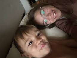 I love finding pictures like this. Our second oldest was hanging out with  our youngest and taking some fun pictures.