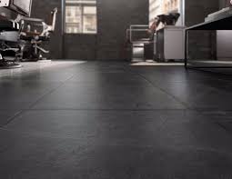 This design is in dark brown that matches the standing area in the lobby. Ideas For Designing A Modern Interior With Black Tiles