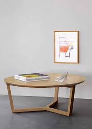 Lime mid century modern coffee table in grey concrete with metal by mfix. The Tripod Coffee Table Is Characterized By Clean Lines And Contemporary Aesthetics Made From Solid Oa Coffee Table Round Wooden Coffee Table Ethnicraft Table
