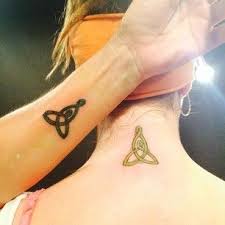 Simple, discreet and innovative, the design is ideal for the trinity knot is a famous form of art from the celtic period. 40 Beautifully Touching Mother Daughter Tattoos Tattoos For Daughters Mother Daughter Tattoos Tattoos
