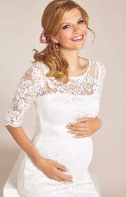 This short lace maternity wedding dress with a belted empire waist and scoop neckline would be a lovely choice for a garden wedding (not to mention a bridal shower or rehearsal dinner). Amelia Lace Maternity Wedding Dress Short Ivory Maternity Wedding Dresses Evening Wear And Party Clothes By Tiffany Rose Maternity Wedding Dress Short Pregnant Wedding Dress Lace Maternity Wedding Dresses