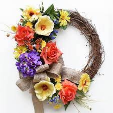 This elegant magnolia wreath incorporates large, realistic, artificial magnolia flowers and leaves on a grapevine oval base. August Grove Rose Magnolia 19 Faux Flower Wreath Wayfair