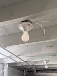 Pot lights) and strategic placement of floor and a room should be lit with bright overhead light and soft lamplight — the variety makes it feel warm and lived in. The Ultimate Guide For Unfinished Basement Lighting Semigloss Design