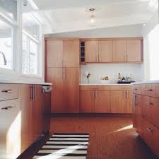 Tucuna Apartment Brick And Wooden Walls In A Modern Apartment With Black Kitchen Kitchen Remodel Cost Mid Century Modern Kitchen Design Modern Kitchen Design