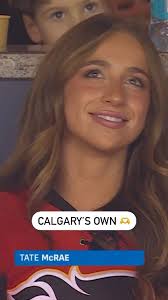 Tate McRae is in the Saddledome taking in the Flames vs. Senators game. 🔥 