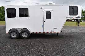Photo's shown with optional equipment. 2020 Harmar Dixie Renegade 2 Horse Trailer With Living Quarters Dixie Horse Mule Co