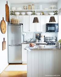 10 Ideas For Decorating Above Kitchen Cabinets Not Sure What To Do With That Awkward Space Above Kitchen Design Small Small Space Kitchen Tiny House Kitchen