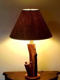 Manzanita Table Lamp With Woven Brown Shade 3 Way Switch Added Detail Of Embedded Axe A Real Slice Of The Outdoors In Your Home Table Lamp Lamp Coffee Table