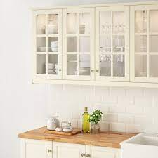 Using glass cabinet doors allows you to get that happy medium between having a solid wooden door and completely open shelving. Bodbyn Glass Door Off White 18x30 Ikea