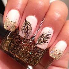 Love glitter, gems and light colors? Glitter Nail Art Designs For New Years