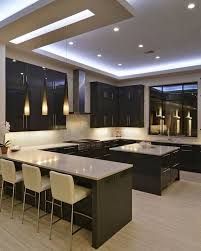You can take a look at the roof style in which a long led tube is surrounded by various small led. Kitchen Pop Fall Ceiling Design