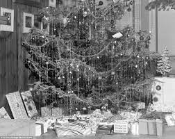 Wishing You A Very Retro Christmas Real Candles In The 1900s A Tinsel Takeover In The 50s And Fake Snow Flocking In The 60s We Reveal How Trees Have Changed Through