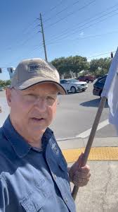 Sign waving at SR60 and Kings HWY!