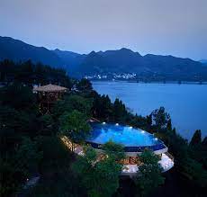 star boat overhead swimming pool on the bank of fuchun river in hangzhou china by the design institute of la landscape architecture swimming pools panoramic