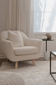Accented seating can be used in the living room, while in the dining room you can take a table. Gabriola Ivory Boucle Lounge Chair Living Room Design Small Spaces Living Room Furniture Chairs Living Room Designs