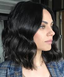 These long black locks are pulled back and pinned to the head to create this casual updo best suited for any casual day or night occasion. Mila Kunis S Short Haircuts And Hairstyles 15