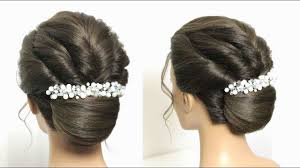 The messy bun—wherein hair is piled on top of the head, and casually arranged—always looks great. French Roll Bun Hairstyle With Twists Simple Craft Ideas