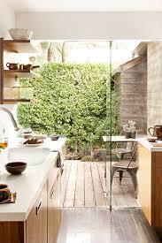 Interior Decor 5 Tips On How To Decorate A Small Kitchen Indoor Outdoor Kitchen Modern Kitchen Design Minimalist Dining Room