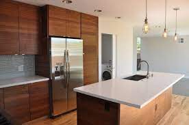 It will allow you to use something like stainless steel and glass to make the kitchen look bright and modern. L Jpg 600 398 Modern Walnut Kitchen Contemporary Walnut Kitchen Walnut Kitchen Cabinets