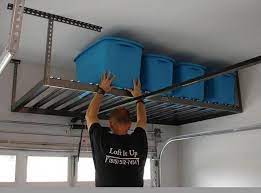 Overhead Garage Storage With Chains And Garage Shelving Malta Garageoverheadstorage Garage Shelving Plans Pegboard Organization Garage Garage Storage Shelves