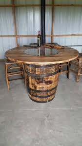 Whiskey Barrel Table With Jack Daniels Barrel Includes Etsy Barrel Table Whiskey Barrel Table Whiskey Barrel Furniture