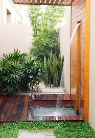 15 Outdoor Shower Ideas That Are Perfect For Any Home Outdoor Shower Enclosure Outdoor Remodel Garden Shower