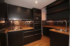 Matte black kitchen with a tiny copper tile backsplash looks minimalist and very chic. Black And Copper Kitchen Ideas Modern Extravagant And Bold Designs