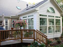 How To Build A Four Season Room On A Deck Ideas For Sunroom Additions This Piedmont Triad Sunroom Provides Year Round Beauty And Comfort Sunroom Designs Sunroom Addition Four Seasons Room