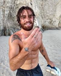 Apa also opened up about his obsession with tattoos, explaining the meaning behind some of his favorites, including the bumble bee on his arm. Kj Apa Grew Out A Beard In Quarantine