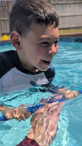 Mitch in again swimming for his life.