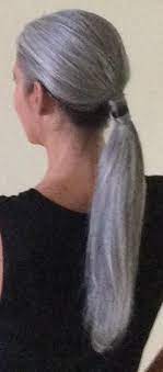 Just Because A Woman Has Grey Hair Doesn T Mean She Has To Wear It Short This Is Really Pretty And Femini Long Gray Hair Silver White Hair Long Silver Hair