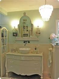 Make your own glass cabinets from some old cabinets or windows, age and whitewash them. Shabby Chic Vanity Visualizeus