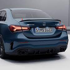 A trio of circular air vents adds decorative flair to the center stack. A 35 Amg Aero Rear Spoiler A Class V177 Genuine Mercedes Benz