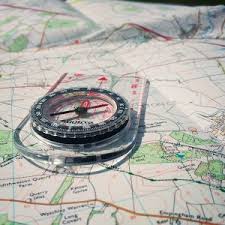 I also recall buying a paper cover book on navigation. Walklakes National Map Reading Week